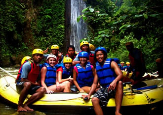 Jurgita river rafting with new friends in Indonesia