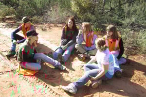 Justine sitting with her ISV volunteer group 
