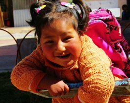 A little girl playing outside