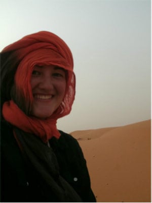Amanda riding a camel in the Sahara Desert!