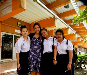 Carla hanging out with three of her students