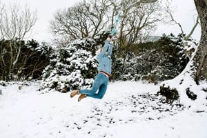 swinging on tree