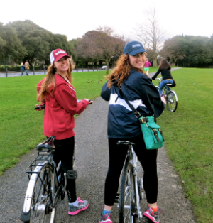 two girls biking phoenix park ireland