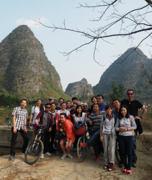 students posing with bikes