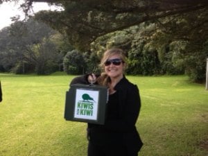Katie releasing a kiwi chick onto a safe island environment.