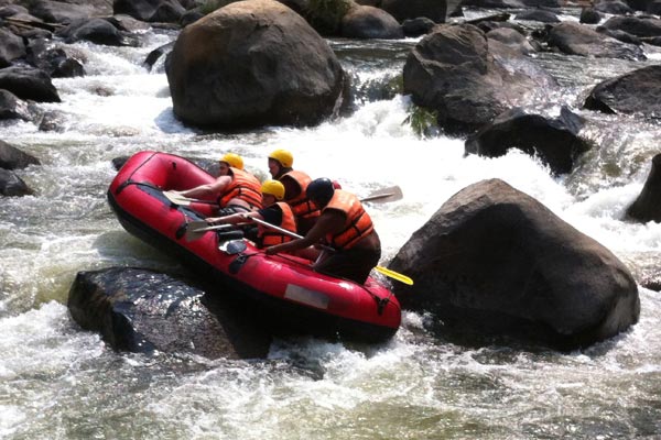Dave whitewater rafting with other Gap Medics