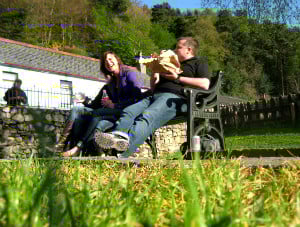 "‘Multitasking’ - offering some clearly inspirational commentary to a student during extended field visit to the Republic of Ireland." A group of people gathered together.