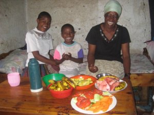 Happy and her two daughters.