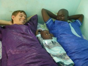 Jordan with his boss and best friend his son at a wedding in the town of Thiès. 