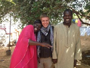 Jordan with his mom, Aminata Ndiaye, and dad, Arona Sarr, in the backyard.