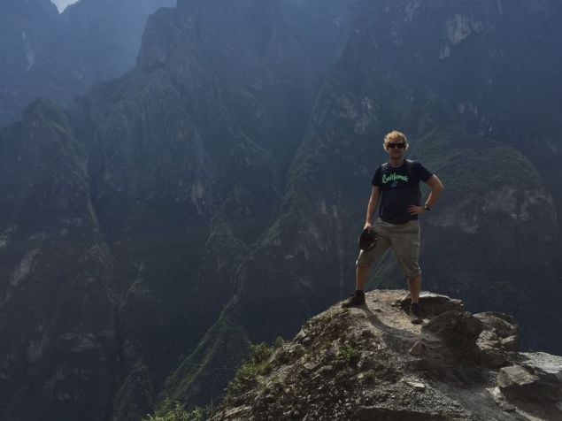 standing on mountain in China