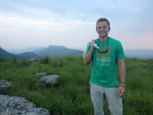 guy smiling on a hike