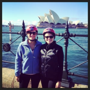 two women biking opera house australia