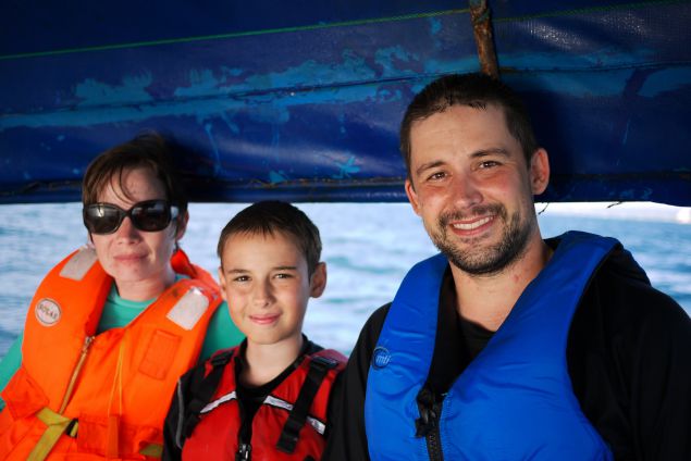 family on boat