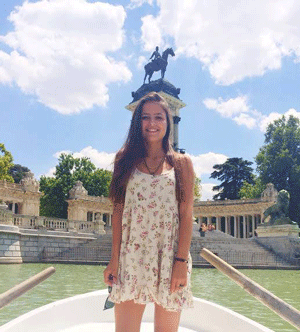 In Madrid, Spain at the Parco Del Retiro on a small boat!