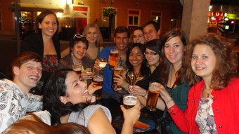 Christinne at a pub with friends in Austria