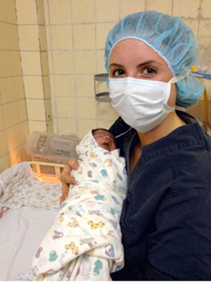 Me holding a newborn baby