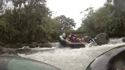 White water rafting down a river in Mindo