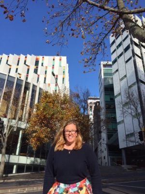 woman smiling on AUT campus