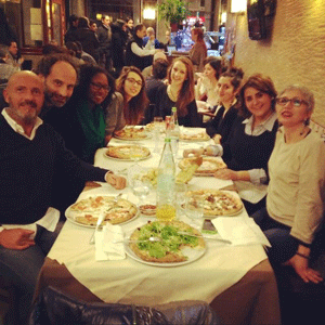 My host family and I having dinner in Turin with a few of their friends