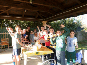 Me and my students baking over 200 chocolate chip cookies for the entire school!