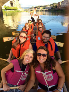 A group of young students gathered together on a boat