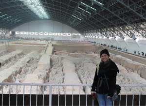 woman in front of terracotta warriors