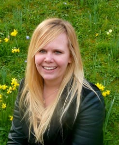 Girl in front of grassland