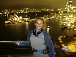 A women standing in front of a city