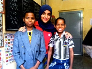 Sara with two of her students at the VWI project site. 