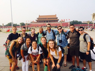 group of travelers smiling