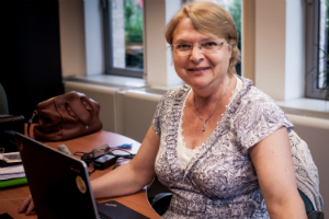 woman sitting at a desk