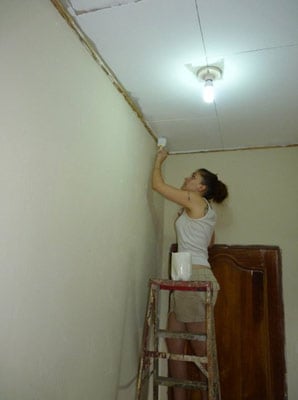 Volunteer painting in Honduras