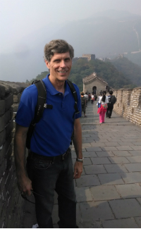 man walking on the great wall of china