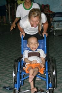 Demi at the orphanage with a young boy who she became quite close to.