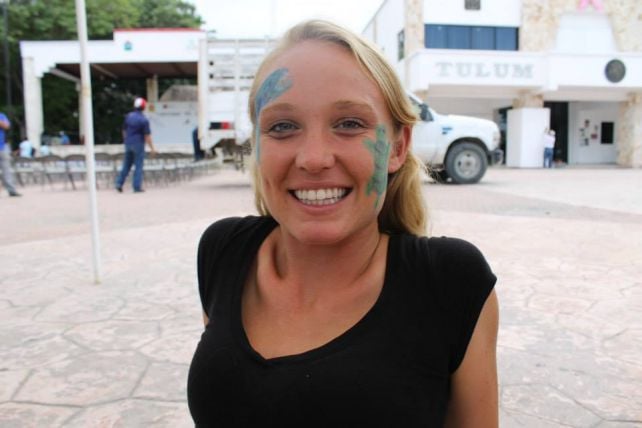woman smiling with facepaint