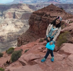 girl hiking and smiling