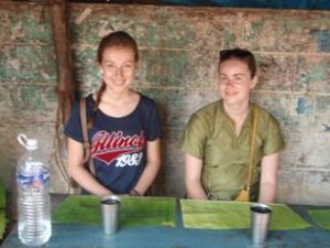 Loretta and Krysten with plantain leaves ready for breakfast.