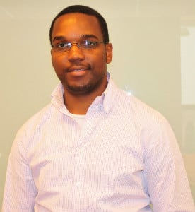 A young man posing for a picture.