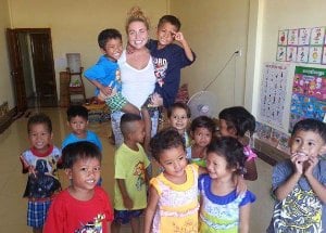 Lacey and the kids in their classroom.