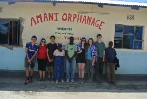 A group of young students gathered together.