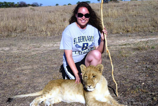 Chelsi befriending a lion during her AIFS program