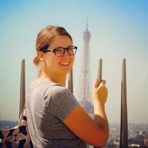 female headshot eiffel tower