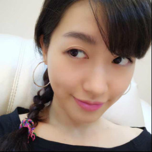 A young woman posing for a picture.