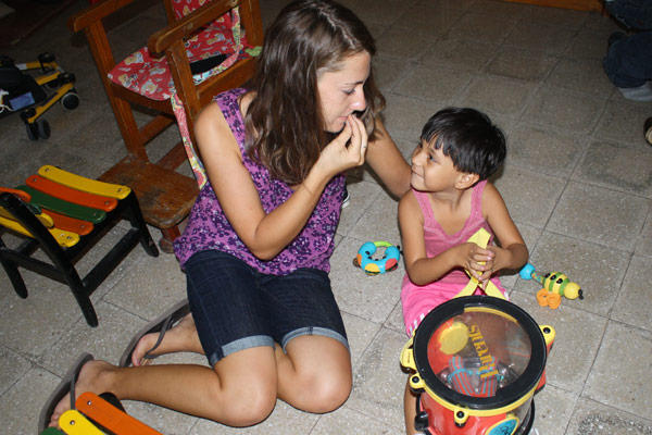 Emily using sign language during her psychology internship