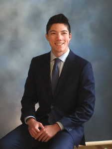 A young man posing for a picture.