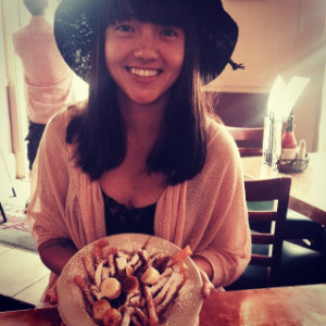 A young woman posing for a picture.