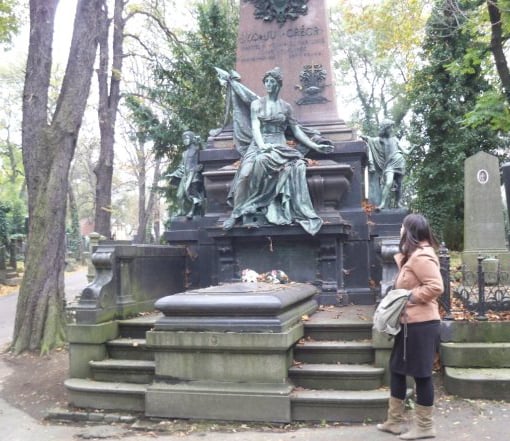 Ashley visiting a cemetery in Prague