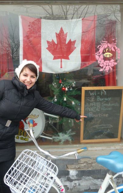 Laura at a Canadian restaurant in Beijing