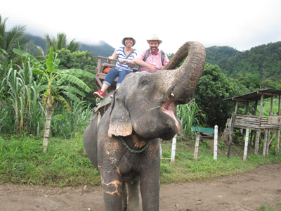 Riding an elephant in Thailand